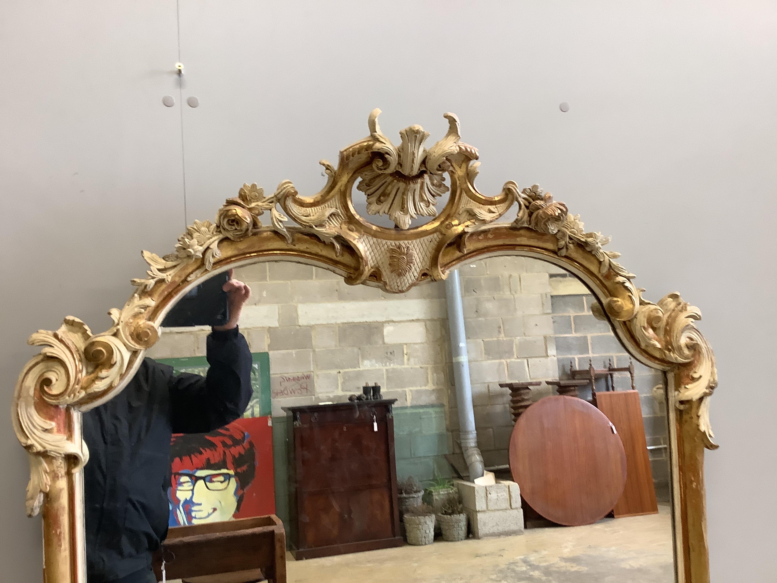 A 19th century carved wood and composition overmantel mirror, re-painted, width 104cm, height 173cm